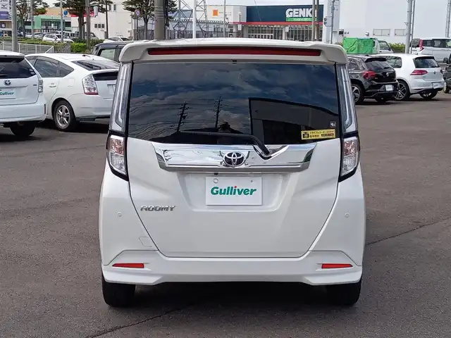 トヨタ ルーミー カスタムG－T 福井県 2023(令5)年 2.6万km パールホワイトⅢ モデリスタフロントエアロ/純正15インチAW/全方位カメラ/両側パワースライドドア/革調シートカバー/全車速追従機能付クルーズコントロール/前後コーナーセンサー/パイオニア9インチメモリナビ/フルセグテレビ/サンシェード/LEDヘッドライト/Fフォグ/オートホールド/本革巻きステアリング/スマートキー