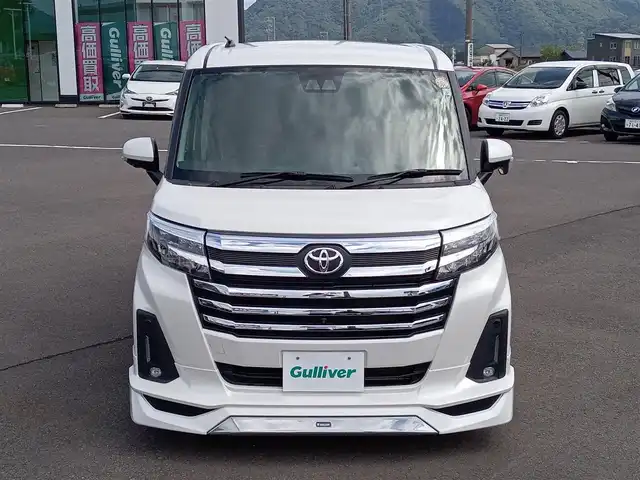 トヨタ ルーミー カスタムG－T 福井県 2023(令5)年 2.6万km パールホワイトⅢ モデリスタフロントエアロ/純正15インチAW/全方位カメラ/両側パワースライドドア/革調シートカバー/全車速追従機能付クルーズコントロール/前後コーナーセンサー/パイオニア9インチメモリナビ/フルセグテレビ/サンシェード/LEDヘッドライト/Fフォグ/オートホールド/本革巻きステアリング/スマートキー