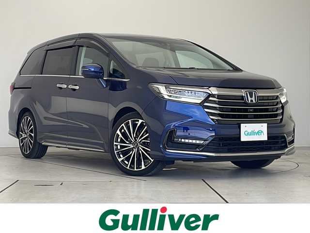 ホンダ オデッセイ ハイブリッド e:HEVアブソルート EX 大阪府 2021(令3)年 2.6万km オブシダンブルーパール 純正10型ナビ/フリップダウンモニター/全方位カメラ/両側パワースライドドア/シートヒーター/バックカメラ/電動リアゲート/パワーシート/コーナーセンサー/純正アルミホイール/ETC2.0/ブラインドスポットモニター/LEDヘッドライト/リアオートエアコン/オートマチックハイビーム/ドライブレコーダー/衝突軽減システム/フルセグ/CD DVD/Bluetooth/ステアリングスイッチ/スマートキー/プッシュスタート