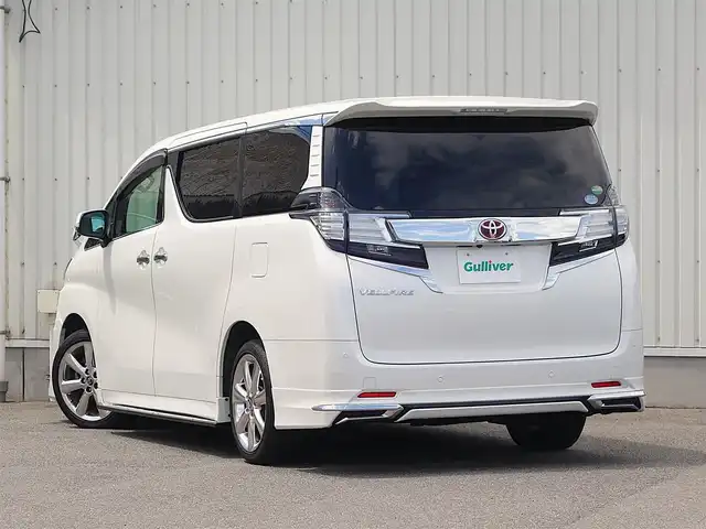 トヨタ ヴェルファイア V 山形県 2017(平29)年 4.5万km ホワイトパールクリスタルシャイン モデリスタエアロ/純正SDナビ/　　【CD DVD BT フルセグ MSV】/バックカメラ/両側パワースライドドア/電動リアゲート/クルーズコントロール/LEDオートヘッドライト/ハーフレザーシート/パワーシート/オットマン/アイドリングストップ/コーナーセンサー/ステアリングスイッチ/MTモード付AT/電動格納ウィンカーミラー/フォグランプ/スマートキー/ETC2.0