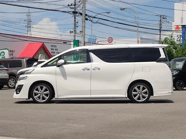 トヨタ ヴェルファイア V 山形県 2017(平29)年 4.5万km ホワイトパールクリスタルシャイン モデリスタエアロ/純正SDナビ/　　【CD DVD BT フルセグ MSV】/バックカメラ/両側パワースライドドア/電動リアゲート/クルーズコントロール/LEDオートヘッドライト/ハーフレザーシート/パワーシート/オットマン/アイドリングストップ/コーナーセンサー/ステアリングスイッチ/MTモード付AT/電動格納ウィンカーミラー/フォグランプ/スマートキー/ETC2.0