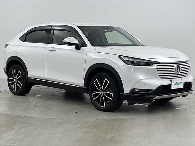 ホンダ ヴェゼル ハイブリッド e:HEV Z 道央・札幌 2023(令5)年 2万km プラチナホワイトパール ・4WD/・寒冷地仕様/・純正ナビ/&BT&USB&フルセグTV&スマートフォン連携/・パワーバックドア/・バックカメラ/・ホンダセンシング/・レーダークルーズコントロール/・前席シートヒーター/・ステアリングヒーター/・ドアミラーヒーター/・純正ドライブレコーダー/・置くだけ充電/・ビルトインETC2.0/・パドルシフト/・純正フロアマット/・LEDヘッドライト/・オートライト/・スマートキー/・スペアキー/・社外AW冬タイヤ積込/・保証書/・取扱説明書