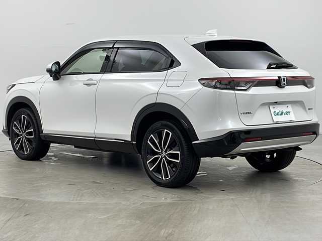 ホンダ ヴェゼル ハイブリッド e:HEV Z 道央・札幌 2023(令5)年 2万km プラチナホワイトパール ・4WD/・寒冷地仕様/・純正ナビ/&BT&USB&フルセグTV&スマートフォン連携/・パワーバックドア/・バックカメラ/・ホンダセンシング/・レーダークルーズコントロール/・前席シートヒーター/・ステアリングヒーター/・ドアミラーヒーター/・純正ドライブレコーダー/・置くだけ充電/・ビルトインETC2.0/・パドルシフト/・純正フロアマット/・LEDヘッドライト/・オートライト/・スマートキー/・スペアキー/・社外AW冬タイヤ積込/・保証書/・取扱説明書