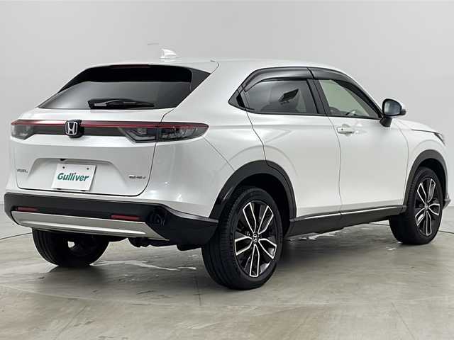 ホンダ ヴェゼル ハイブリッド e:HEV Z 道央・札幌 2023(令5)年 2万km プラチナホワイトパール ・4WD/・寒冷地仕様/・純正ナビ/&BT&USB&フルセグTV&スマートフォン連携/・パワーバックドア/・バックカメラ/・ホンダセンシング/・レーダークルーズコントロール/・前席シートヒーター/・ステアリングヒーター/・ドアミラーヒーター/・純正ドライブレコーダー/・置くだけ充電/・ビルトインETC2.0/・パドルシフト/・純正フロアマット/・LEDヘッドライト/・オートライト/・スマートキー/・スペアキー/・社外AW冬タイヤ積込/・保証書/・取扱説明書
