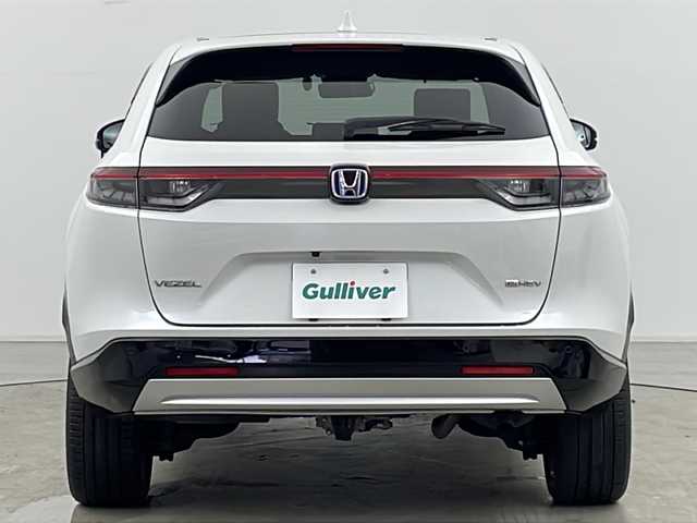 ホンダ ヴェゼル ハイブリッド e:HEV Z 道央・札幌 2023(令5)年 2万km プラチナホワイトパール ・4WD/・寒冷地仕様/・純正ナビ/&BT&USB&フルセグTV&スマートフォン連携/・パワーバックドア/・バックカメラ/・ホンダセンシング/・レーダークルーズコントロール/・前席シートヒーター/・ステアリングヒーター/・ドアミラーヒーター/・純正ドライブレコーダー/・置くだけ充電/・ビルトインETC2.0/・パドルシフト/・純正フロアマット/・LEDヘッドライト/・オートライト/・スマートキー/・スペアキー/・社外AW冬タイヤ積込/・保証書/・取扱説明書