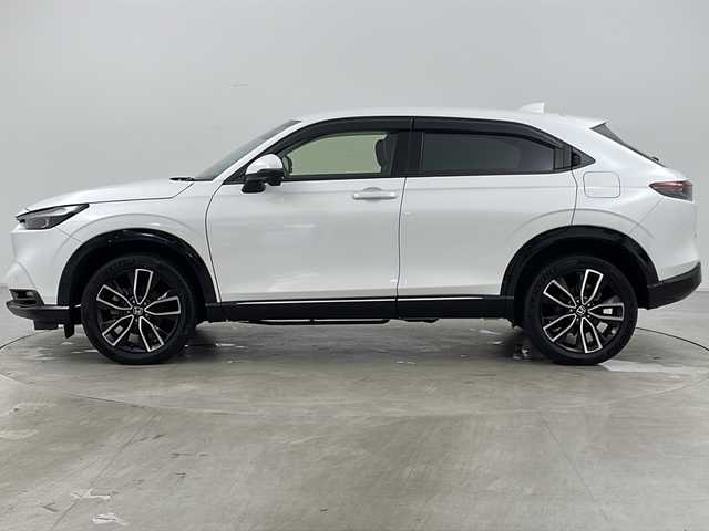 ホンダ ヴェゼル ハイブリッド e:HEV Z 道央・札幌 2023(令5)年 2万km プラチナホワイトパール ・4WD/・寒冷地仕様/・純正ナビ/&BT&USB&フルセグTV&スマートフォン連携/・パワーバックドア/・バックカメラ/・ホンダセンシング/・レーダークルーズコントロール/・前席シートヒーター/・ステアリングヒーター/・ドアミラーヒーター/・純正ドライブレコーダー/・置くだけ充電/・ビルトインETC2.0/・パドルシフト/・純正フロアマット/・LEDヘッドライト/・オートライト/・スマートキー/・スペアキー/・社外AW冬タイヤ積込/・保証書/・取扱説明書