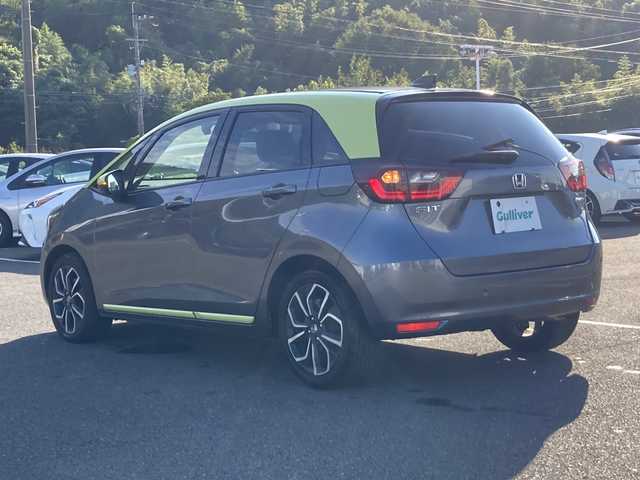 ホンダ フィット e:HEVネス 佐賀県 2020(令2)年 5.5万km シャイニンググレーM Gathers8インチナビ/バックカメラ/衝突被害軽減ブレーキ/路線逸脱警報/アダプティブクルーズコントロール/クリアランスソナー/電動パーキングブレーキ/オートブレーキホールド/ビルトインETC/ドライブレコーダー/ステアリングリモコン/プッシュスタート/スマートキー/LEDヘッドライト/フォグライト/純正アルミホイール