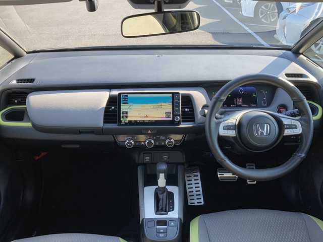 ホンダ フィット e:HEVネス 佐賀県 2020(令2)年 5.5万km シャイニンググレーM Gathers8インチナビ/バックカメラ/衝突被害軽減ブレーキ/路線逸脱警報/アダプティブクルーズコントロール/クリアランスソナー/電動パーキングブレーキ/オートブレーキホールド/ビルトインETC/ドライブレコーダー/ステアリングリモコン/プッシュスタート/スマートキー/LEDヘッドライト/フォグライト/純正アルミホイール