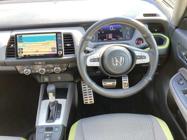 ホンダ フィット e:HEVネス 佐賀県 2020(令2)年 5.5万km シャイニンググレーM Gathers8インチナビ/バックカメラ/衝突被害軽減ブレーキ/路線逸脱警報/アダプティブクルーズコントロール/クリアランスソナー/電動パーキングブレーキ/オートブレーキホールド/ビルトインETC/ドライブレコーダー/ステアリングリモコン/プッシュスタート/スマートキー/LEDヘッドライト/フォグライト/純正アルミホイール