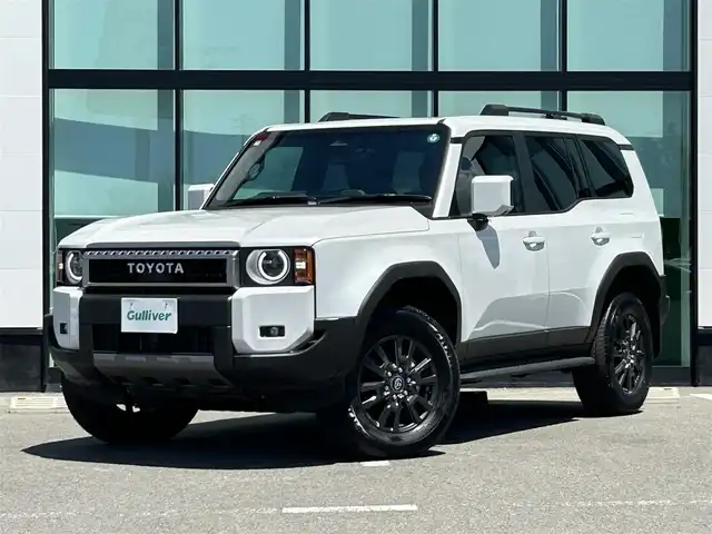 トヨタ ランドクルーザー ２５０ VX 和歌山県 2024(令6)年 0.1万km プラチナホワイトパールマイカ 純正12.3インチナビ/全方位カメラ/BT/HDMI/衝突被害軽減ブレーキ/レーンキープアシスト/レーダークルーズコントロール/前後コーナーセンサー/オートライト/ブラインドスポットモニター/サンルーフ/ビルトインETC2.0/ドラレコ/デジタルインナーミラー/前席/・シートヒーター/・シートベンチレーション/・パワーシート/電動リアゲート/ルーフレール/純正18インチアルミ