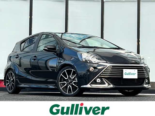 トヨタ アクア G G’s 山形県 2015(平27)年 9万km ブラックマイカ 禁煙車/横滑り防止装置/クルーズコントロール/純正ナビ/（Bluetooth/CD/DVD/フルセグ)/バックカメラ/ハーフレザーシート/LEDオートライト/フォグランプ/純正ドライブレコーダー/ステアリングスイッチ/ビルトインETC/純正AW/純正フロアマット/電動格納ウィンカーミラー/スマートキー