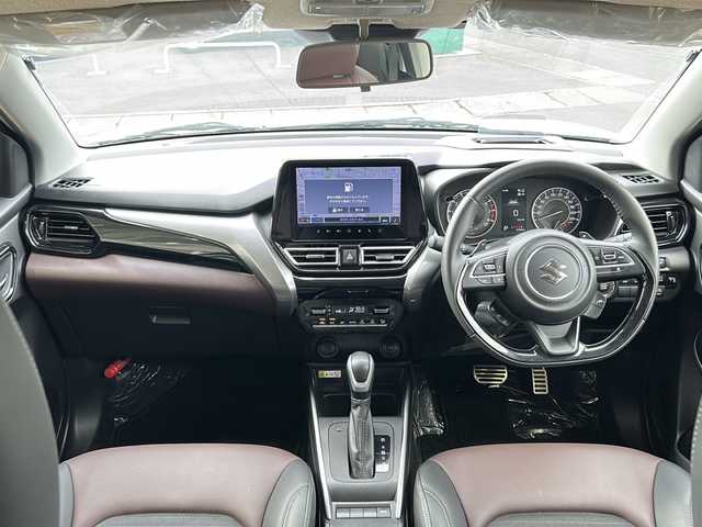 スズキ フロンクス 静岡県 2024(令6)年 0.7万km パールⅡ 純正ナビ/・フルセグTV/・FM/AM/・Bluetooth/・USB/・iPod/・HDMI/・Smartphone Link/主要装備/・全方位カメラ/・ワイヤレス充電器/・前席シートヒーター/・ＥＴＣ/・ヘッドアップディスプレイ/・衝突被害軽減システム/・アイドリングストップ/・レーンキープアシスト/・追従クルコン/・電動パーキング/・オートホールド/・パドルシフト/・ステリモ/・ハーフレザーシート