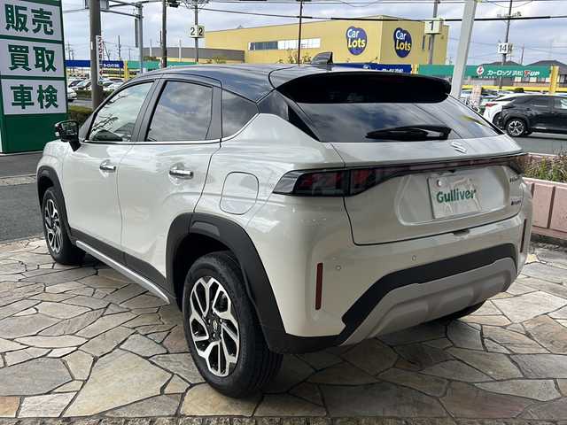 スズキ フロンクス 静岡県 2024(令6)年 0.7万km パールⅡ 純正ナビ/・フルセグTV/・FM/AM/・Bluetooth/・USB/・iPod/・HDMI/・Smartphone Link/主要装備/・全方位カメラ/・ワイヤレス充電器/・前席シートヒーター/・ＥＴＣ/・ヘッドアップディスプレイ/・衝突被害軽減システム/・アイドリングストップ/・レーンキープアシスト/・追従クルコン/・電動パーキング/・オートホールド/・パドルシフト/・ステリモ/・ハーフレザーシート