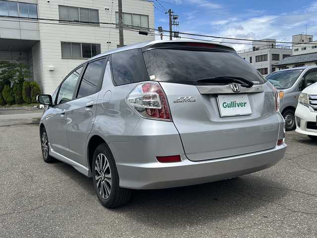 ホンダ フィット シャトル 15X クールエディション 福井県 2014(平26)年 7.3万km アラバスターシルバーメタリック ワンオーナー /純正HDDナビゲーション/（CD/DVD）/ワンセグテレビ/バックカメラ/クルーズコントロール/パドルシフト/オートライト/ステアリングリモコン/HIDヘッドライト/フォグランプ/シートヒーター/純正15インチアルミホイール/スマートキー/ETC/電動格納ミラー/保証書/取扱説明書