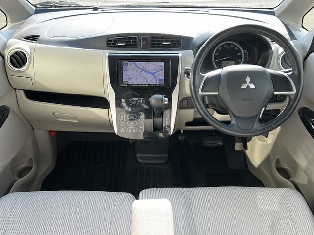 三菱 ｅＫワゴン G e－アシスト 岐阜県 2015(平27)年 6.8万km サクラピンクメタリック 登録時走行距離67796km/社外７型ナビ　/Bluetooth/ＥＴＣ　/純正１４インチアルミホイール　/プッシュスタート　/スマートキー　/ＡＢＳ　/横滑り防止装置　/衝突軽減システム　/アイドリングストップ　/フロアマット　/ベンチシート　/フラットシート/ライトレベライザー