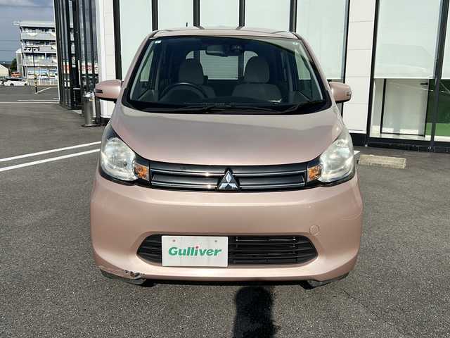 三菱 ｅＫワゴン G e－アシスト 岐阜県 2015(平27)年 6.8万km サクラピンクメタリック 登録時走行距離67796km/社外７型ナビ　/Bluetooth/ＥＴＣ　/純正１４インチアルミホイール　/プッシュスタート　/スマートキー　/ＡＢＳ　/横滑り防止装置　/衝突軽減システム　/アイドリングストップ　/フロアマット　/ベンチシート　/フラットシート/ライトレベライザー
