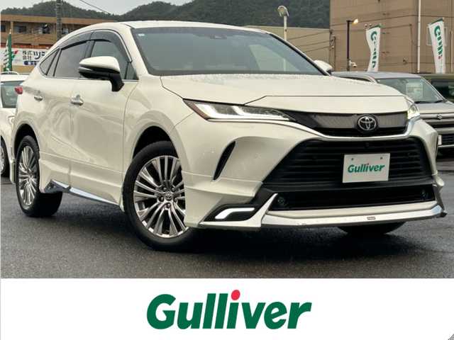 トヨタ ハリアー Z レザーパッケージ 広島県 2020(令2)年 1.8万km ホワイトパールクリスタルシャイン ワンオーナー/モデリスタエアロ（デイライト付き）/純正ナビ（Miracast/Bluetooth）/・フルセグTV（走行中視聴可）/・JBLプレミアムサウンド/全方位モニター/ETC2.0/前後ドライブレコーダー/デジタルインナーミラー/黒レザーシート/・シートヒーター/・エアシート/・パワーシート（メモリー機能付き）/衝突被害軽減ブレーキ/レーダークルーズコントロール/コーナーセンサー/車線逸脱警報/オートマチックハイビーム/ブラインドスポットモニター/ステアリングヒーター/パワーバックドア/ヘッドアップディスプレイ