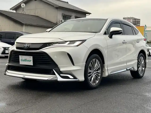 トヨタ ハリアー Z レザーパッケージ 広島県 2020(令2)年 1.8万km ホワイトパールクリスタルシャイン ワンオーナー/モデリスタエアロ（デイライト付き）/純正ナビ（Miracast/Bluetooth）/・フルセグTV（走行中視聴可）/・JBLプレミアムサウンド/全方位モニター/ETC2.0/前後ドライブレコーダー/デジタルインナーミラー/黒レザーシート/・シートヒーター/・エアシート/・パワーシート（メモリー機能付き）/衝突被害軽減ブレーキ/レーダークルーズコントロール/コーナーセンサー/車線逸脱警報/オートマチックハイビーム/ブラインドスポットモニター/ステアリングヒーター/パワーバックドア/ヘッドアップディスプレイ
