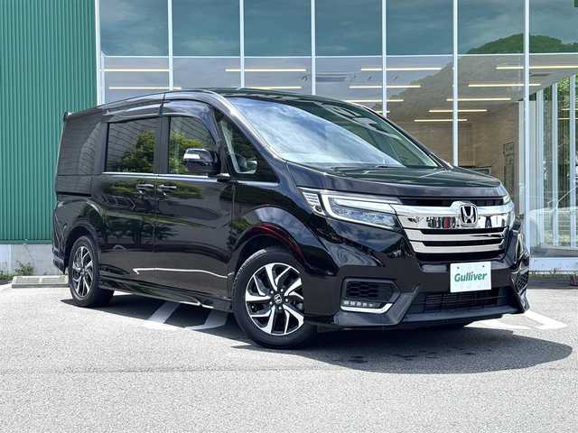 ホンダ ステップワゴン スパーダ 愛媛県 2018(平30)年 4.9万km プレミアムスパークルブラックパール 禁煙車　ストラーダ１０インチナビ　フルセグＴＶ　Ｂｌｕｅｔｏｏｔｈ　DVD バックカメラ　パワースライドドア　７人乗り　ＬＥＤヘッドライト　オートライト　パドルシフト　クルーズコントロール　ＥＴＣ　