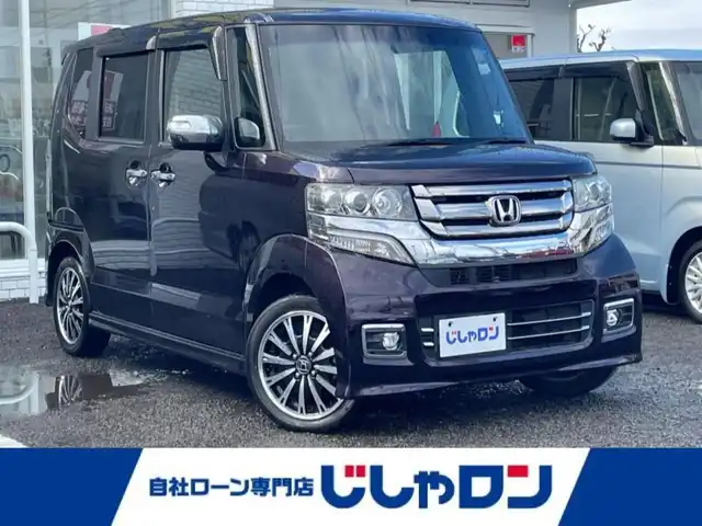 ホンダ Ｎ ＢＯＸ G ターボ Lパッケージ 徳島県 2015(平27)年 6.5万km プレミアムベルベットパープル・パール (株)IDOMが運営する【じしゃロン徳島店】の自社ローン専用車両になりますこちらは現金またはオートローンご利用時の価格です。/自社ローンご希望の方は別途その旨お申付け下さい”		/評価点4.5															/社外8型ナビゲーション/バックカメラ/後席フリップダウンモニター/ハーフレザーシート/HIDヘッドライト/フォグランプ/プッシュスタート/スマートキー	/スペアキー