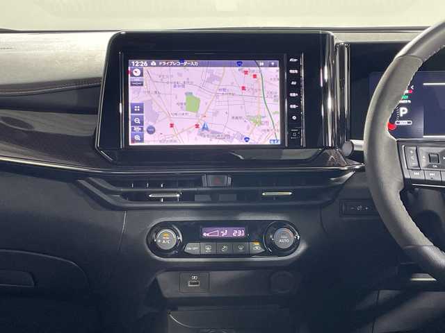 日産 オーラ ニスモ 神奈川県 2023(令5)年 1.8万km スーパーブラック 純正9型メモリーナビゲーション【MM222D-L】/フルセグ　AM FM SD　Bluetooth　HDMI/インテリジェントアラウンドビューモニター/インテリジェントルームミラー/全方位運転支援システム/インテリジェントエマージェンシーブレーキ/踏み間違い衝突防止アシスト/標識認識機能/前方衝突予測警報/車線逸脱警報/ふらつき警報/車線逸脱防止支援システム/エマージェンシーストップシグナル/後側方衝突防止支援システム/後側方車両検知警報/後退時車両検知警報/ETC2.0/革/アルカンターラ巻コンビステアリング/アドバンスドドライブアシストディスプレイ/ブラック合皮/ファブリックコンビシート/全席USBタイプA電源ソケット/純正前後ドライブレコーダー【ナビ連動】/D-MODE/電動パーキングブレーキ/オートブレーキホールド/プッシュスタート/スマートキー/アダブティブLEDヘッドランプ/オートライト/LEDフロントフォグランプ/オートハイビーム/LEDリアフォグランプ/純正サイド/リアスポイラー/純正17インチアルミホイール/スペアキー