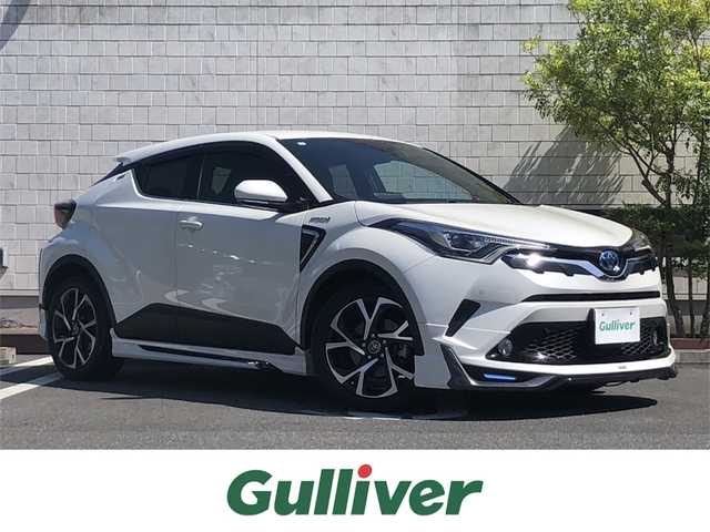 トヨタ Ｃ－ＨＲ G 愛媛県 2017(平29)年 5.6万km ホワイトパールクリスタルシャイン モデリスタフルエアロ/・BOOST IMPULSESTYLE/純正9インチナビ(NSZT-Y66T)/・CD/DVD/フルセグTV /Bluetooth/・MSV/SD/バックカメラ/茶革シート/・D/Nシートヒーター/前方ドライブレコーダー/衝突軽減ブレーキ/レーンキープ アシスト/レーダークルーズコントロール/ブラインドスポットモニター/オートブレーキホールド/・電動パーキング/オートハイビーム /・LEDオートライト/前後クリアランスソナー /ETC/スマートキー/・スペアキー/取扱説明書/保証書