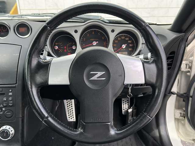 日産 フェアレディ Ｚ バージョンT 茨城県 2006(平18)年 7.7万km ホワイトパール Z34純正19inアルミホイール/BOSEサウンドシステム/黒革レザーシート/パワーシート/シートヒーター/ETC/オートライト/HIDヘッドライト/リモコンキー