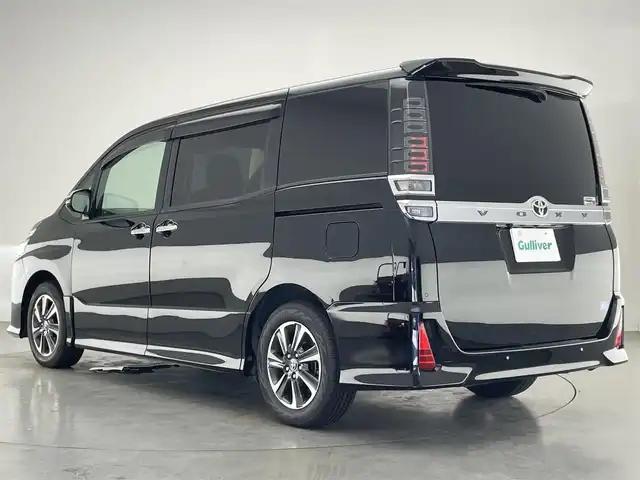 トヨタ ヴォクシー ZS 煌Ⅲ 愛知県 2021(令3)年 4.5万km ブラック トヨタセーフティセンス/純正９インチナビ/純正フリップダウンモニター/ETC/バックカメラ/両側パワースライドドア/前後ドライブレコーダー/ハーフレザーシート/LEDヘッドライト/エンジンスタートボタン/純正フロアマット/衝突被害軽減ブレーキ/オートライト/オートマチックハイビーム/コーナーセンサー/チップアップシート/クルーズコントロール/純正9型ナビ　純正12型後席モニター　8人　両側電動スライドドア　セーフティセンス　衝突軽減　LEDオートライト　追従クルコン　ハーフレザー　バックカメラ　前後ドラレコ　ETC　スマートキー WAC