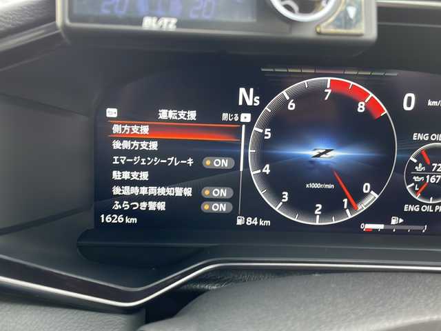 日産 フェアレディ Ｚ バージョンST 東京都 2024(令6)年 0.2万km パールⅡ 車体色　XKJ　プリズムホワイト×スーパーブラック/新車時保証書/ナビ説明書/エマージェンシーブレーキ/前・側・後方支援/インテリジェントクルーズコントロール/純正ナビ/フルセグTV【走行中映ります】/BT/USB/AppleCarplay/BOSEサウンド/バックカメラ　ETC2.0/LEDヘッドライト/オートライト/スマートキー×2【キータグ有】/革巻きハンドル/RECAROシート/BLITZ車高調/SR-SDIXELローター＆パッド/社外１９インチアルミ【TWS】