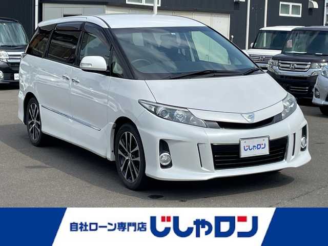 トヨタ エスティマ アエラス プレミアムエディション 宮城県 2015(平27)年 10.7万km ホワイトパールクリスタルシャイン (株)IDOMが運営する【じしゃロン仙台店】の自社ローン専用車両になりますこちらは現金またはオートローンご利用時の価格です。自社ローンご希望の方は別途その旨お申付け下さい/ハーフレザーシート/パワーシート/両側パワースライドドア/8インチSDナビ/フルセグ/Bluetooth/CD/DVD/バックカメラ/ETC/パワーバックドア/クルコン/HIDヘッドライト