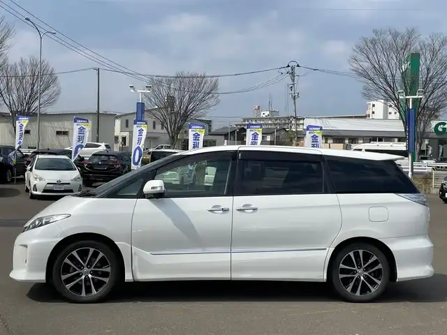 トヨタ エスティマ アエラス プレミアムエディション 宮城県 2015(平27)年 10.7万km ホワイトパールクリスタルシャイン (株)IDOMが運営する【じしゃロン仙台店】の自社ローン専用車両になりますこちらは現金またはオートローンご利用時の価格です。自社ローンご希望の方は別途その旨お申付け下さい/ハーフレザーシート/パワーシート/両側パワースライドドア/8インチSDナビ/フルセグ/Bluetooth/CD/DVD/バックカメラ/ETC/パワーバックドア/クルコン/HIDヘッドライト