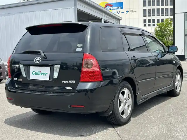 トヨタ カローラ フィールダー S 40thアニバーサリーLTD 青森県 2006(平18)年 16万km ブラックマイカ ・純正オーディオ/・AM/FM/・オートライト/・HIDライト/・社外16インチアルミホイール/・純正フロアマット/・ダブルエアバック/・取扱説明書