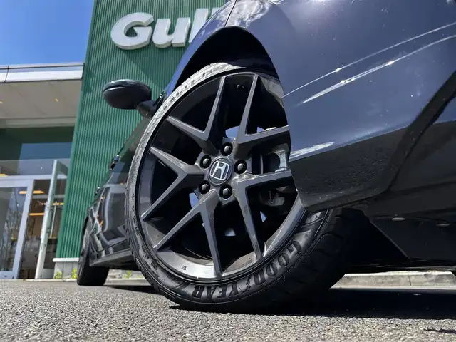 ホンダ シビック RS 宮城県 2025(令7)年 1.8万km クリスタルブラックパール ワンオーナー/BOSEプレミアムサウンドシステム/ホンダセンシング/●衝突軽減ブレーキ（CMBS）/●先行車発進お知らせ機能/●歩行者事故低減ステアリング/●路外逸脱抑制機能/●標識認識機能/●渋滞追従機能付アダプティブクルーズコントロール（ACC） /●車線維持支援システム（LKAS）/●ブラインドスポットインフォメーション/●近距離衝突軽減ブレーキ/●パーキングセンサーシステム/●後退出庫サポート/●アダプティブドライビングビーム/ホンダコネクトディスプレー/・車内Wi-Fi/・地デジTV/・AppleCarPlay/AndroidAuto/・Googleマップ/GooglePlay/・9インチワイドディスプレイ/・バックカメラ/・充電用USBジャック/・ETC2.0/ワイヤレス充電器/ハーフレザーシート/シートヒーター/パワーシート/革巻きステアリング/ステアリングスイッチ/電動パーキングブレーキ/ブレーキホールド/LEDヘッドランプ/オートライト/スマートキー＆プッシュスタート/電動格納ミラー/純正18インチAW/フロアマット/W/サイド/カーテンエアバッグ/取扱説明書/保証書