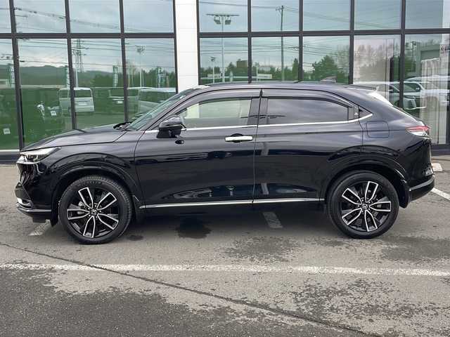 ホンダ ヴェゼル ハイブリッド e:HEV Z 道東・釧路十勝 2021(令3)年 4.1万km クリスタルブラックパール ・ワンオーナー/・４WD/・純正9インチナビ/（BT・ラジオ・USB・フルセグ・スマートフォン連携）/・バックカメラ/・レーダークルーズコントロール/・パドルシフト/・ステアリングヒーター/・ハーフレザーシート/・前席シートヒーター/・ドアバイザー/・LEDヘッドライト/・フォグライト/・前後コーナーセンサー/・パワーバックドア/・純正ドライブレコーダー/・純正フロアマット/・横滑り防止装置/・オートライト/・衝突被害軽減ブレーキ/・レーンキープアシスト/・純正18インチアルミホイール/・置くだけ充電/・保証書