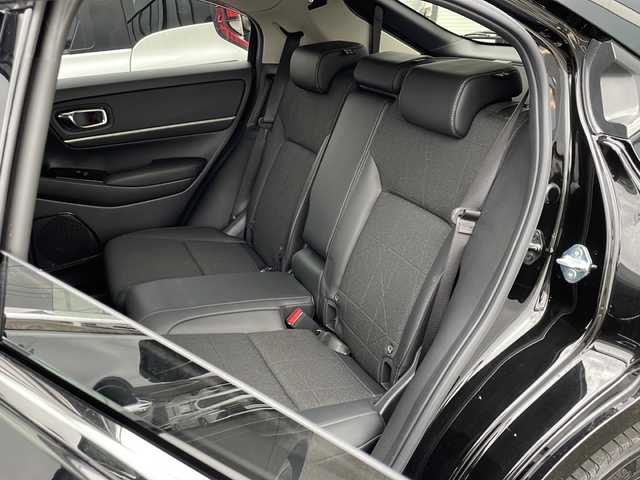 ホンダ ヴェゼル ハイブリッド e:HEV Z 道東・釧路十勝 2021(令3)年 4.1万km クリスタルブラックパール ・ワンオーナー/・４WD/・純正9インチナビ/（BT・ラジオ・USB・フルセグ・スマートフォン連携）/・バックカメラ/・レーダークルーズコントロール/・パドルシフト/・ステアリングヒーター/・ハーフレザーシート/・前席シートヒーター/・ドアバイザー/・LEDヘッドライト/・フォグライト/・前後コーナーセンサー/・パワーバックドア/・純正ドライブレコーダー/・純正フロアマット/・横滑り防止装置/・オートライト/・衝突被害軽減ブレーキ/・レーンキープアシスト/・純正18インチアルミホイール/・置くだけ充電/・保証書