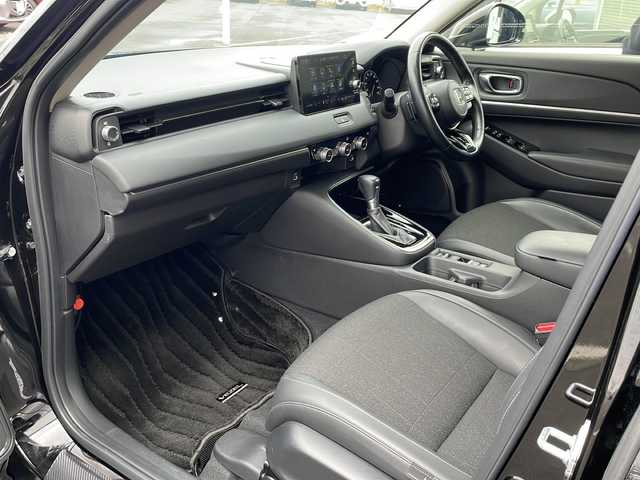 ホンダ ヴェゼル ハイブリッド e:HEV Z 道東・釧路十勝 2021(令3)年 4.1万km クリスタルブラックパール ・ワンオーナー/・４WD/・純正9インチナビ/（BT・ラジオ・USB・フルセグ・スマートフォン連携）/・バックカメラ/・レーダークルーズコントロール/・パドルシフト/・ステアリングヒーター/・ハーフレザーシート/・前席シートヒーター/・ドアバイザー/・LEDヘッドライト/・フォグライト/・前後コーナーセンサー/・パワーバックドア/・純正ドライブレコーダー/・純正フロアマット/・横滑り防止装置/・オートライト/・衝突被害軽減ブレーキ/・レーンキープアシスト/・純正18インチアルミホイール/・置くだけ充電/・保証書