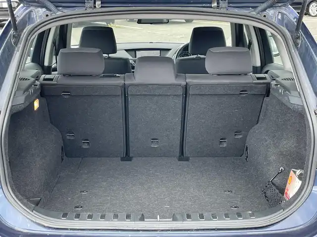 ＢＭＷ Ｘ１ xDrive 25i 道央・札幌 2010(平22)年 7.5万km ディープシーブルー ４WD/純正メーカーナビ/CD/DVD/BT/DTC/ダウンヒルアシストコントロール/ミラー一体型ETC/サンルーフ/前席パワーシート/D席シートヒーター/革巻きステアリング/ステアリングリモコン/MTモード付AT/プッシュスタート/スマートキー/HIDヘッドライト/オートライト/フォグランプ/電動格納ミラー/フロアマット/スペアキー