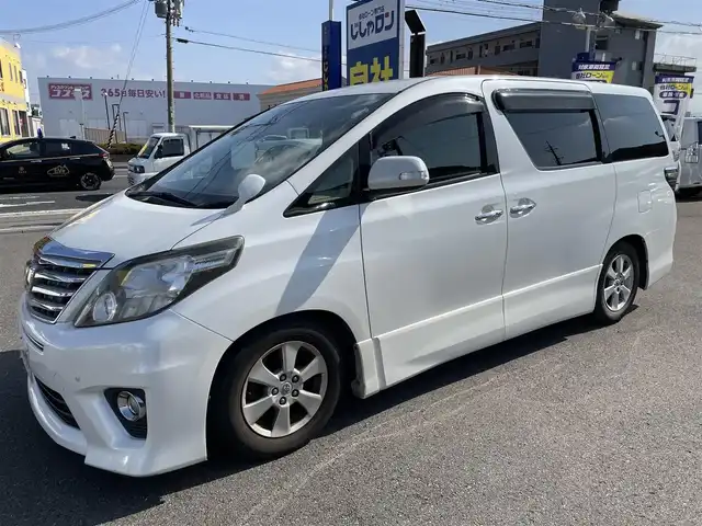 トヨタ アルファード 240S 和歌山県 2012(平24)年 14万km ホワイトパールクリスタルシャイン (株)IDOMが運営する【じしゃロン和歌山店】の自社ローン専用車両になります。こちらは現金またはオートローンご利用時の価格です。自社ローンご希望の方は別途その旨お申付け下さい/純正7インチナビ/フルセグTV/ETC/バックカメラ/両側パワースライドドア/純正フリップダウン/純正フロアマット/純正アルミホイール/ヴァレンティ製社外テールライト/RSR製ダウンサス