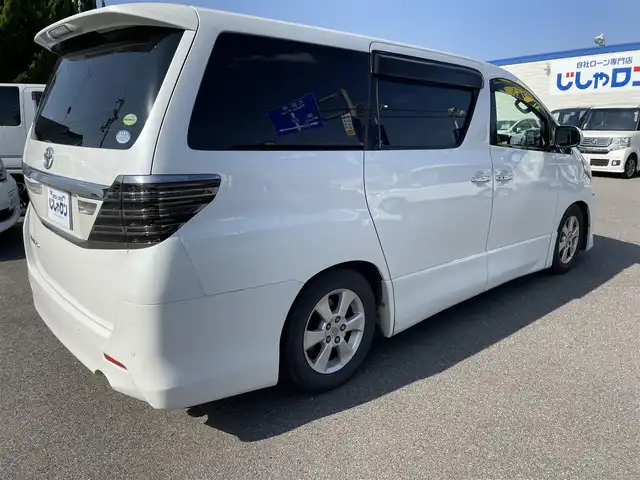 トヨタ アルファード 240S 和歌山県 2012(平24)年 14万km ホワイトパールクリスタルシャイン (株)IDOMが運営する【じしゃロン和歌山店】の自社ローン専用車両になります。こちらは現金またはオートローンご利用時の価格です。自社ローンご希望の方は別途その旨お申付け下さい/純正7インチナビ/フルセグTV/ETC/バックカメラ/両側パワースライドドア/純正フリップダウン/純正フロアマット/純正アルミホイール/ヴァレンティ製社外テールライト/RSR製ダウンサス