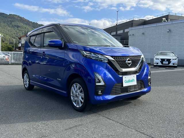 日産 デイズ ハイウェイスターX 山梨県 2021(令3)年 2.6万km アトランティックブルー 4WD/純正ナビ/BT/フルセグTV/CD/DVD/AUX/アラウンドビューモニター/シートヒーター前席/アイドリングストップ/ステアリングリモコン/純正フロアマット/スマートキー/スペアキー1本/ドライブレコーダ/ETC/純正アルミホイール