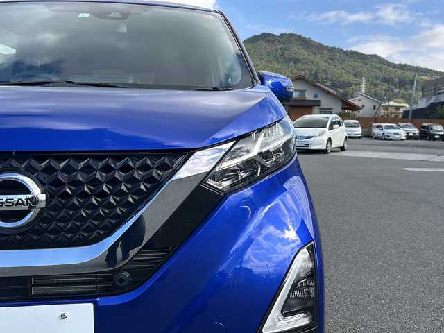 日産 デイズ ハイウェイスターX 山梨県 2021(令3)年 2.6万km アトランティックブルー 4WD/純正ナビ/BT/フルセグTV/CD/DVD/AUX/アラウンドビューモニター/シートヒーター前席/アイドリングストップ/ステアリングリモコン/純正フロアマット/スマートキー/スペアキー1本/ドライブレコーダ/ETC/純正アルミホイール