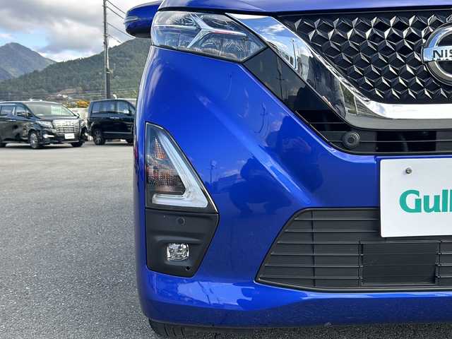 日産 デイズ ハイウェイスターX 山梨県 2021(令3)年 2.6万km アトランティックブルー 4WD/純正ナビ/BT/フルセグTV/CD/DVD/AUX/アラウンドビューモニター/シートヒーター前席/アイドリングストップ/ステアリングリモコン/純正フロアマット/スマートキー/スペアキー1本/ドライブレコーダ/ETC/純正アルミホイール