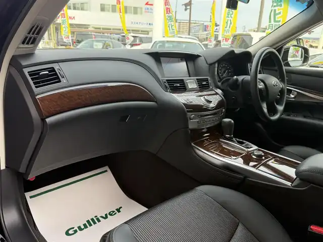 日産 フーガ ハイブリッド 香川県 2017(平29)年 5万km スーパーブラック ワンオーナー/メーカーナビ/フルセグ/アラウンドビューモニター/ハーフレザーシート/前席パワーシート/オットマン/純正18インチアルミ/LEDヘッドライト/エマージェンシーブレーキ/レーダークルーズコントロール/BSM/ドライブレコーダー/スマートキー/ビルトインETC