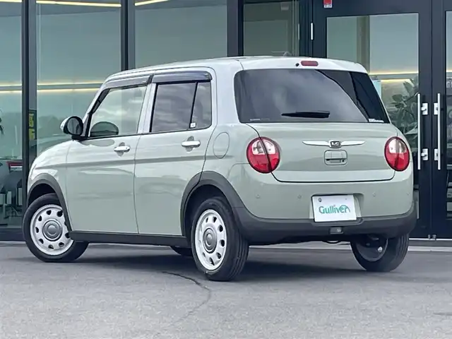 スズキ ラパン X 東京都 2025(令7)年 1.3万km トラッドカーキメタリック/ソフトベージュ 2トーン 純正ディスプレイオーディオ/ドライブレコーダー/フロアマット/Bluetooth/クリアランスソナー/前席シートヒーター/バックカメラ/革巻きステアリング/ステアリングスイッチ/アイドリングストップ/レーンキープアシスト/衝突軽減ブレーキ/ハーフレザーシート