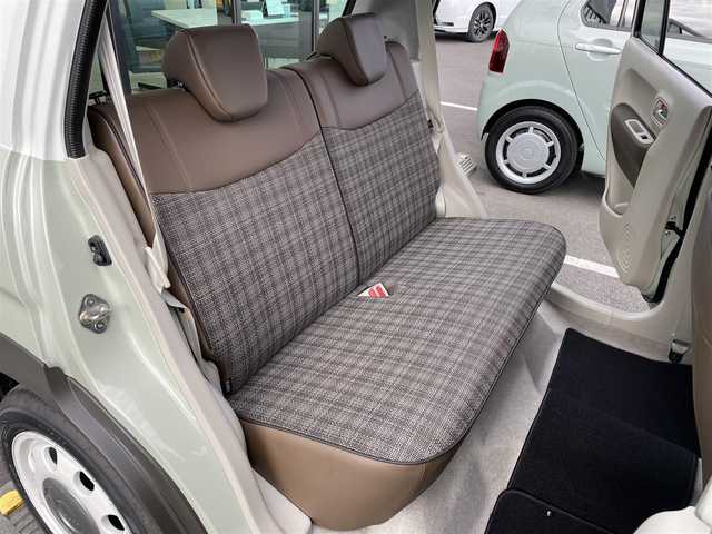 スズキ ラパン X 東京都 2025(令7)年 1.3万km トラッドカーキメタリック/ソフトベージュ 2トーン 純正ディスプレイオーディオ/ドライブレコーダー/フロアマット/Bluetooth/クリアランスソナー/前席シートヒーター/バックカメラ/革巻きステアリング/ステアリングスイッチ/アイドリングストップ/レーンキープアシスト/衝突軽減ブレーキ/ハーフレザーシート