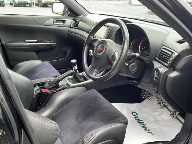 スバル インプレッサ ＷＲＸ 静岡県 2010(平22)年 15.7万km オブシディアンブラックパール プッシュスタート/スマートキー/社外ナビ/　フルセグTV/BTオーディオ/DVD/ハーフレザーシート/キセノンライト/サイド、カーテンエアバック