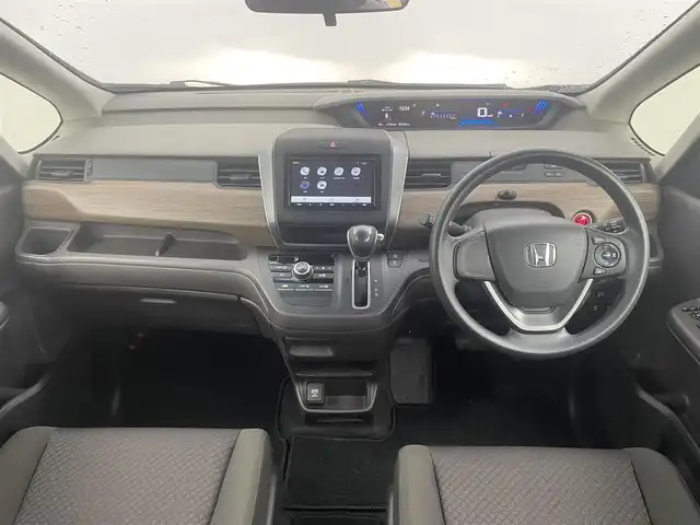 ホンダ フリード B ホンダセンシング 大分県 2020(令2)年 2.8万km クリスタルブラックパール 社外SDナビ/（フルセグ/CD/Bluetooth）/ホンダセンシング/衝突軽減ブレーキ/レーダークルーズコントロール/レーンアシスト/バックカメラ/ヘッドライトレベライザー/スマートキー/プッシュスタート/オートライト/オートエアコン/両側スライドドア