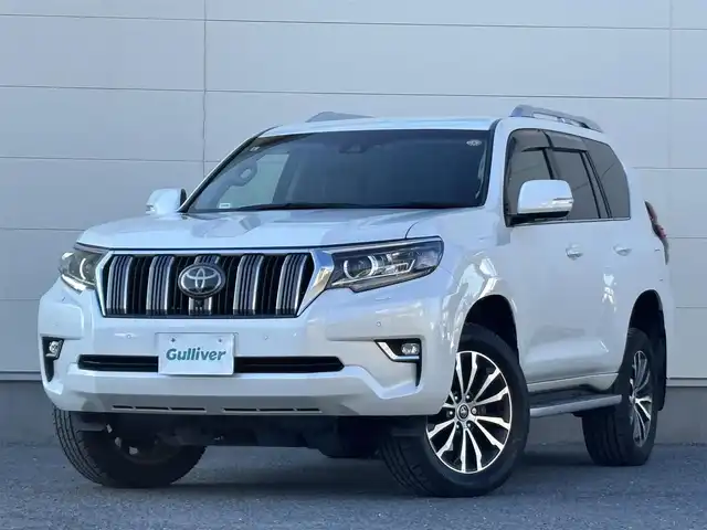トヨタ ランドクルーザー プラド TZ－G 茨城県 2019(令1)年 5万km ホワイトパールクリスタルシャイン ワンオーナー/純正ナビ/　(AM/FM/CD/DVD/USB/Bluetooth/フルセグ)/全方位カメラ/前方ドライブレコーダー/クリアランスソナー/レーダークルーズコントロール/ETC2.0/LEDヘッドライト/レザーシート/シートベンチレーション/SoundWaveセキュリティシステム/ルーフレール/電動格納3列シート/純正アルミホイール/レーンキープアシスト/オートライト/W+サイドエアバック/カーテンエアバック/パワーステアリング/ワンオーナー/新車時保証書