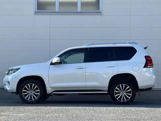 トヨタ ランドクルーザー プラド TZ－G 茨城県 2019(令1)年 5万km ホワイトパールクリスタルシャイン ワンオーナー/純正ナビ/　(AM/FM/CD/DVD/USB/Bluetooth/フルセグ)/全方位カメラ/前方ドライブレコーダー/クリアランスソナー/レーダークルーズコントロール/ETC2.0/LEDヘッドライト/レザーシート/シートベンチレーション/SoundWaveセキュリティシステム/ルーフレール/電動格納3列シート/純正アルミホイール/レーンキープアシスト/オートライト/W+サイドエアバック/カーテンエアバック/パワーステアリング/ワンオーナー/新車時保証書