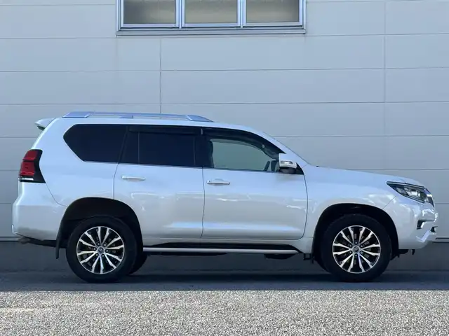 トヨタ ランドクルーザー プラド TZ－G 茨城県 2019(令1)年 5万km ホワイトパールクリスタルシャイン ワンオーナー/純正ナビ/　(AM/FM/CD/DVD/USB/Bluetooth/フルセグ)/全方位カメラ/前方ドライブレコーダー/クリアランスソナー/レーダークルーズコントロール/ETC2.0/LEDヘッドライト/レザーシート/シートベンチレーション/SoundWaveセキュリティシステム/ルーフレール/電動格納3列シート/純正アルミホイール/レーンキープアシスト/オートライト/W+サイドエアバック/カーテンエアバック/パワーステアリング/ワンオーナー/新車時保証書